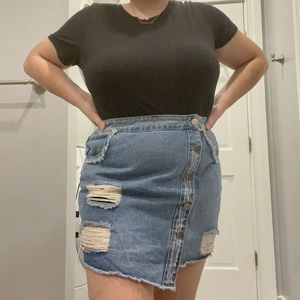 Plus size ripped denim mini skirt